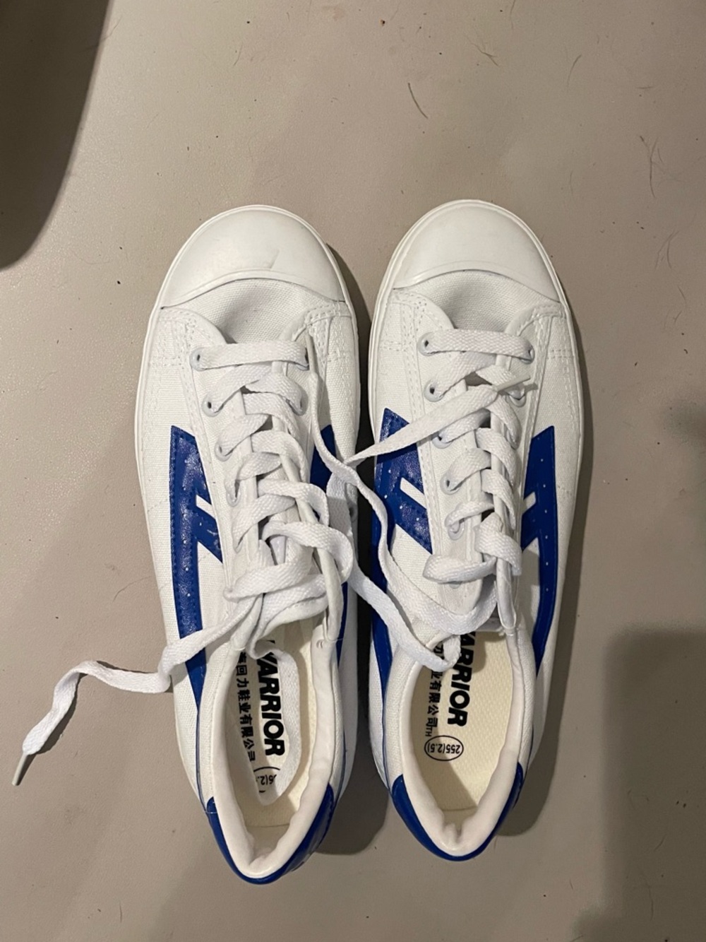 White Sneakers with Blue Accent — Warrior Branding